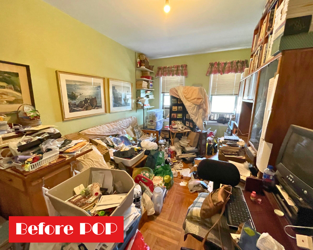A very crowded living room with lots of clutter, many items on the floor, overwhelming pileup of objects.