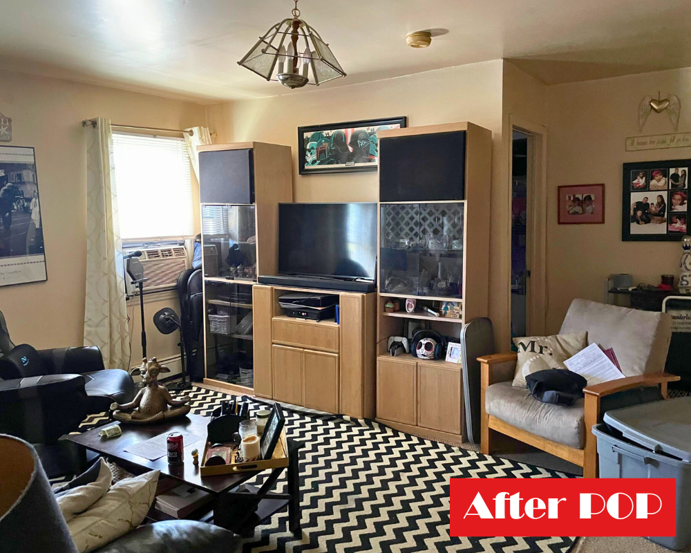 After working with us: family living room with personal photos, clear floor and TV system